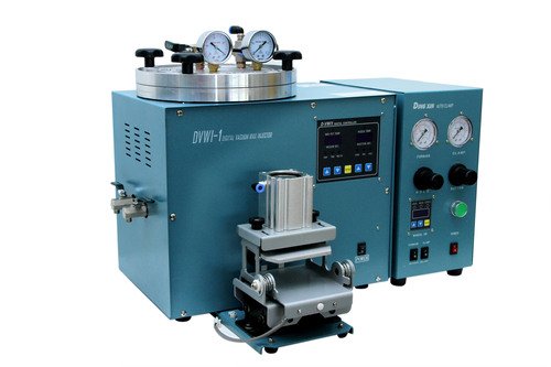 Auto clamp wax injector